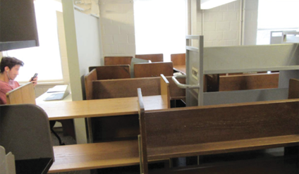 Figure 6. photo of Student Studying in Library South (Photo by Tara Grebe)